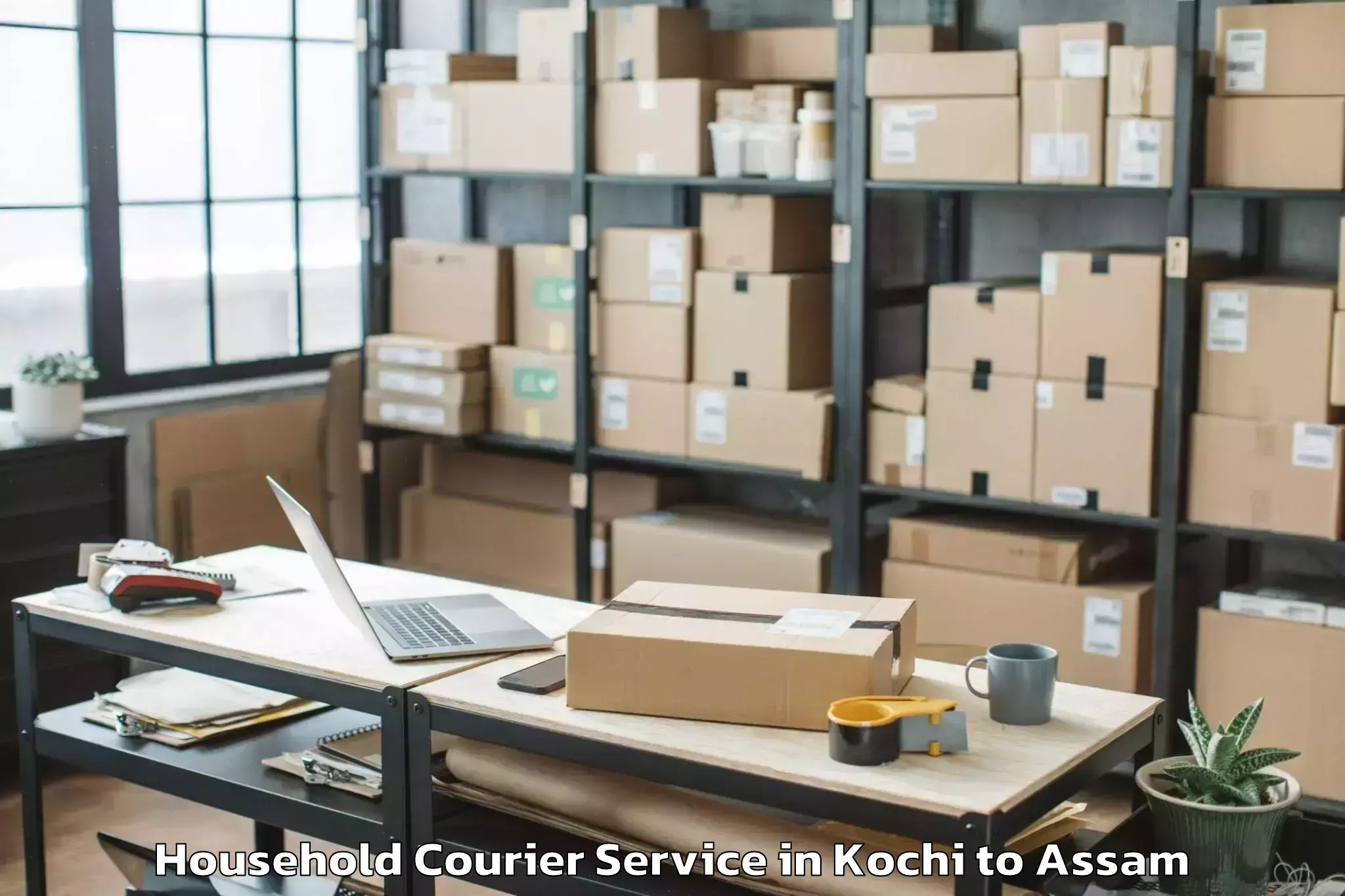 Book Kochi to Dhakuakhana Pt Household Courier Online